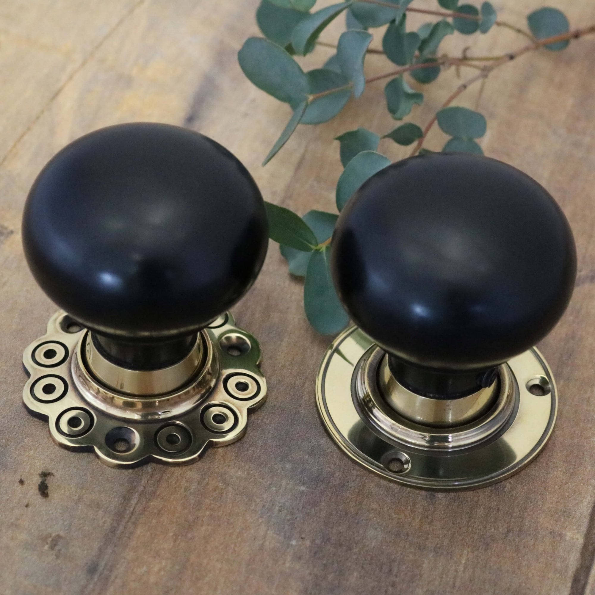 Ebony Bun Door Knobs - Brass Rose