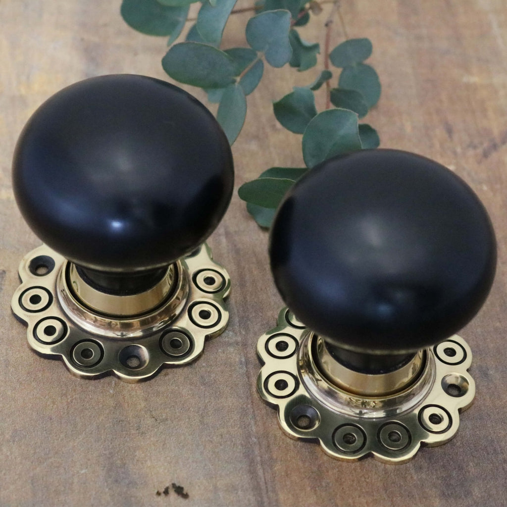 Ebony Bun Door Knobs - Brass Rose