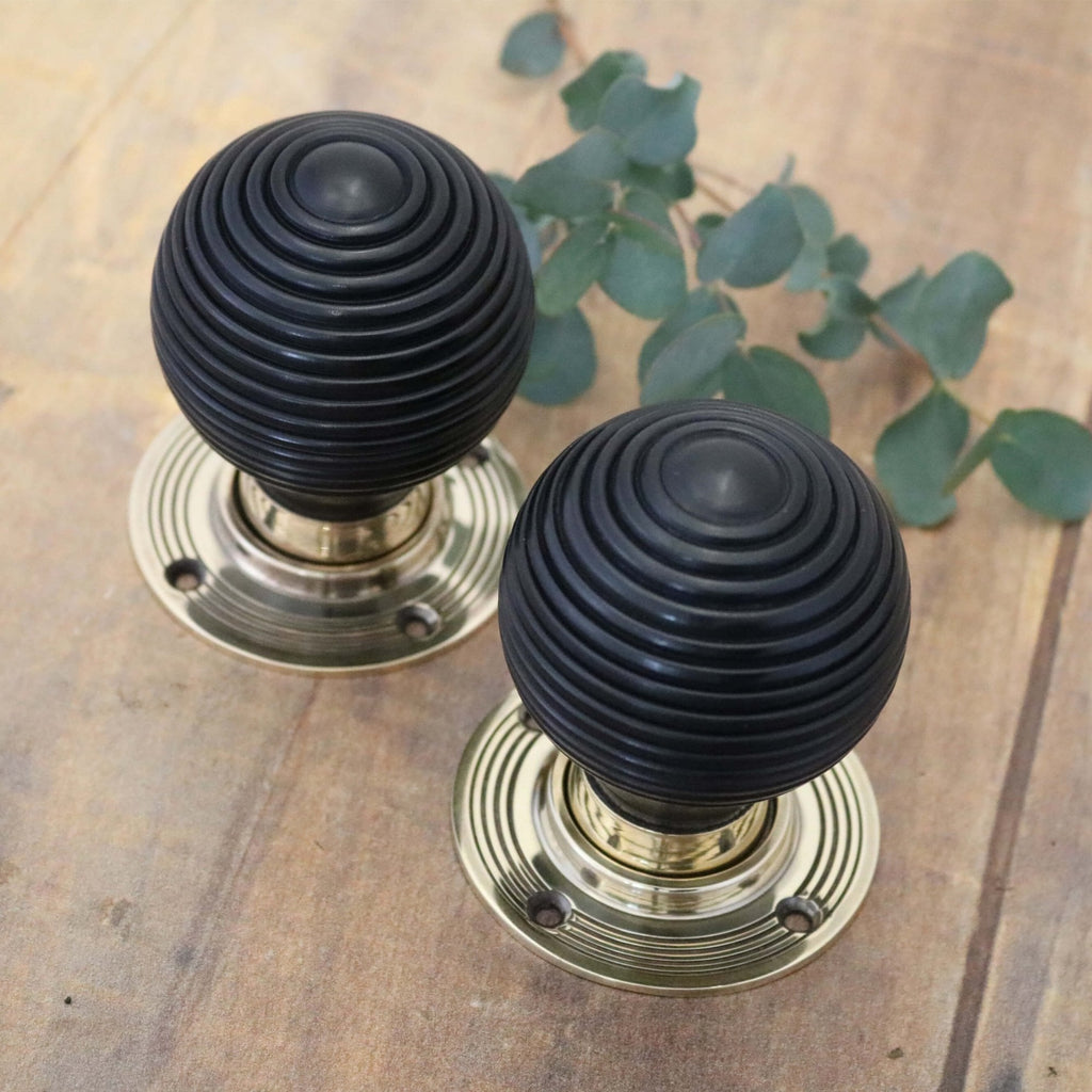 Ebony Beehive Door Knobs - Brass Rose