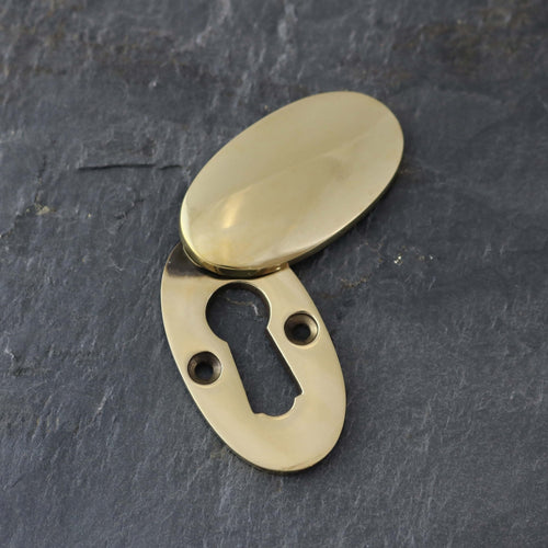 Aged Brass Period Oval Escutcheons