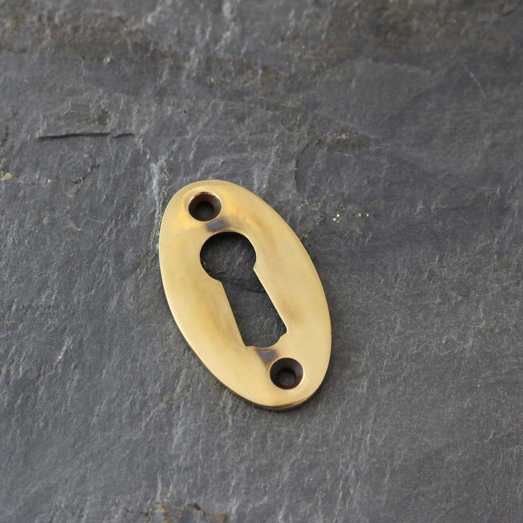 Aged Brass Period Oval Escutcheons