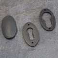 Aged Bronze Period Oval Escutcheons