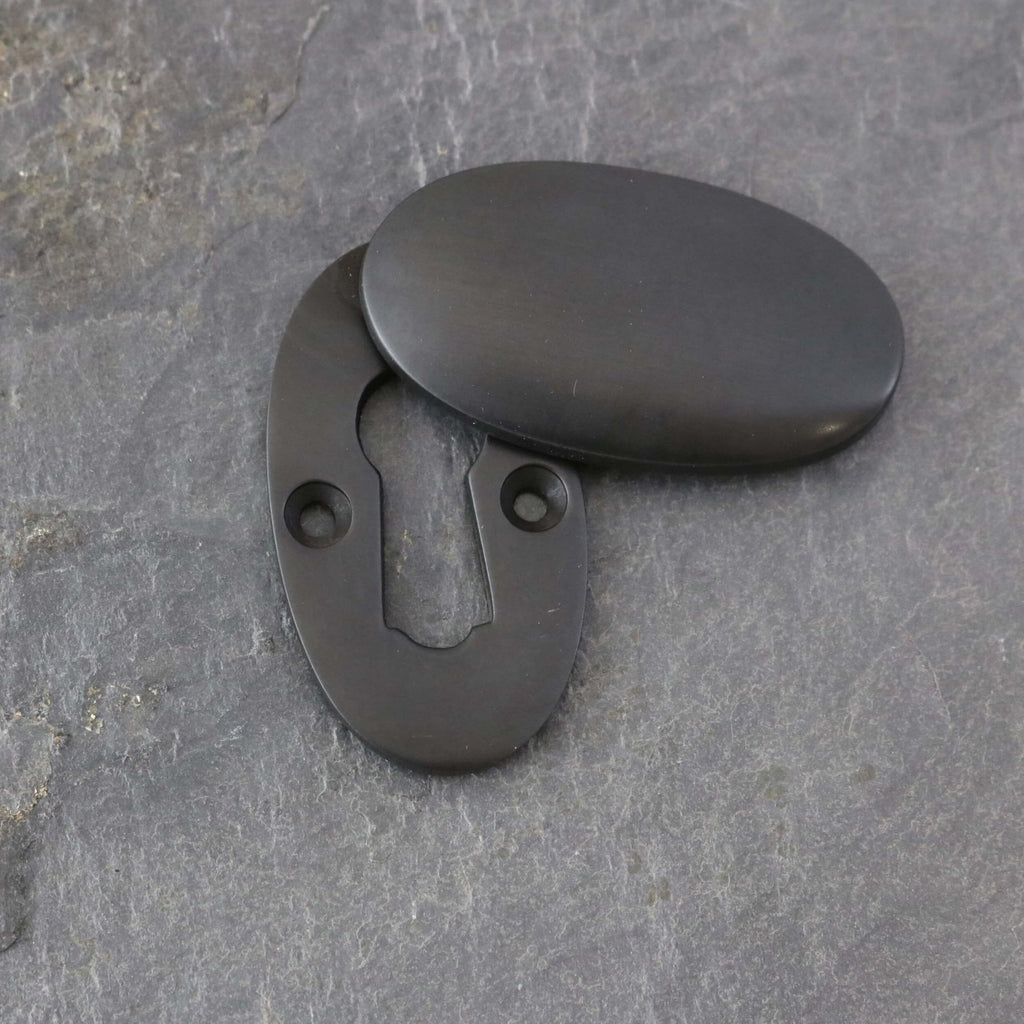 Aged Bronze Period Oval Escutcheons