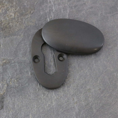 Aged Bronze Period Oval Escutcheons