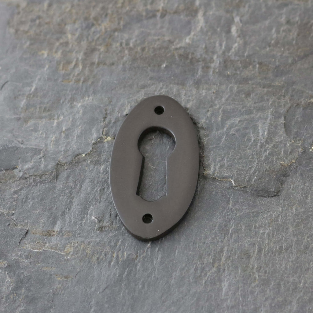 Aged Bronze Period Oval Escutcheons